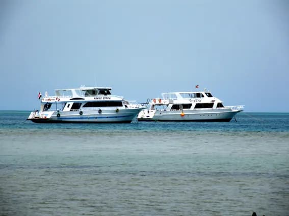 Red Sea day boats moored over a reef off Marsa Alam, Egypt